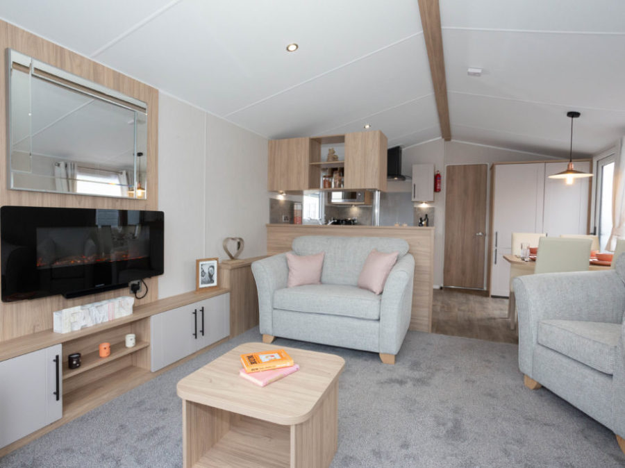 Picture of the lounge in a Willerby Manor 38 x 12 2 bedroom Static Caravan Holiday Home, sited at The Orchard Holiday Park, Wells next the Sea, North Norfolk.