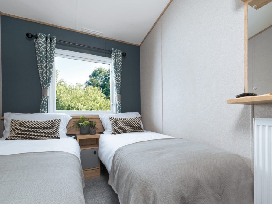 Picture of the twin bedroom in a ABI St. David 38 x 12 2 bedroom Static Hoilday Caravan sited on Friary Farm Caravan Park, Blakeney, North Norfolk.