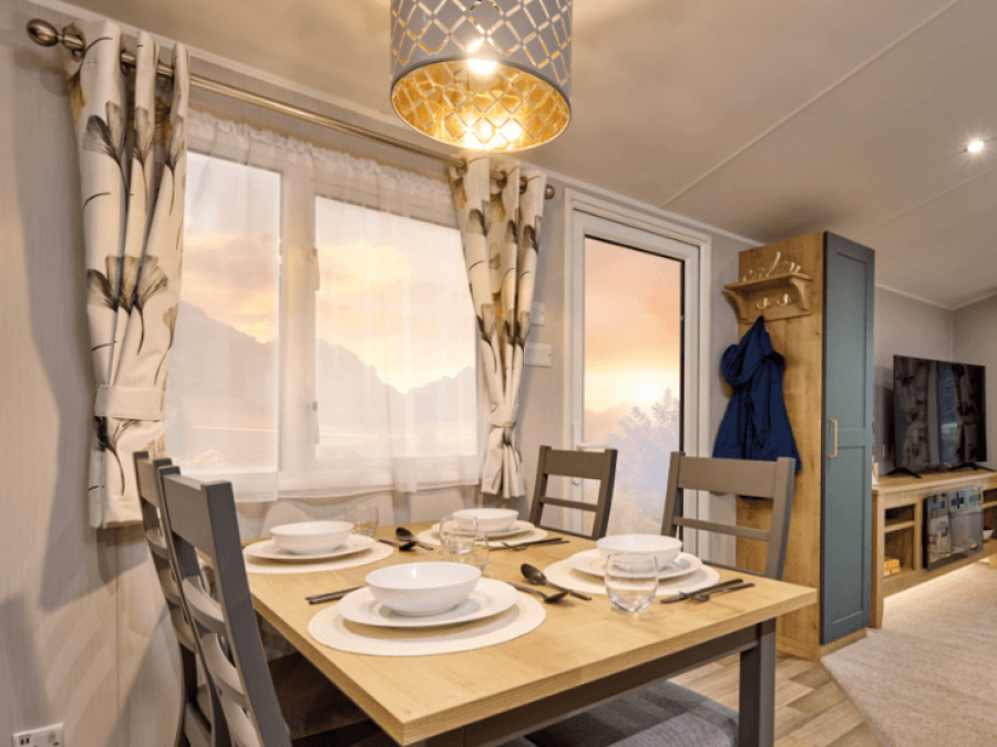 Picture of the dining area in a Willerby Sierra 38 x 12  2 bedroom Static Holiday Caravan sited at Friary Farm Caravan Park, Blakeney, North Norfolk.