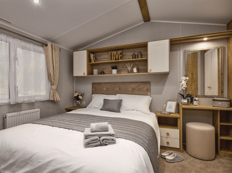 Picture of the master bedroom in a Willerby Sierra 38 x 12  2 bedroom Static Holiday Caravan sited at Friary Farm Caravan Park, Blakeney, North Norfolk.