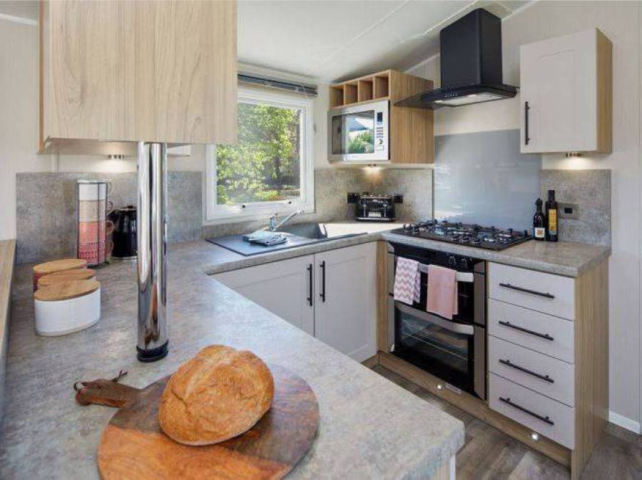 Picture of the kitchen in a Willerby Manor 35 x 12  2 bedroom Static Holiday Caravan sited at Friary Farm Caravan Park, Blakeney, North Norfolk.