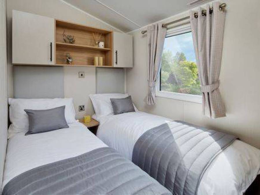 Picture of the twin bedroom in a Willerby Manor 35 x 12  2 bedroom Static Holiday Caravan sited at Friary Farm Caravan Park, Blakeney, North Norfolk.