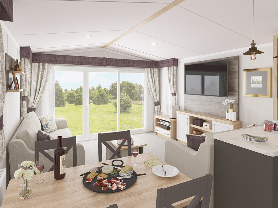 Picture of the lounge and dining area in a Swift Bordeaux 35 x 12  2 bedroom Static Holiday Caravan sited at Friary Farm Caravan Park, Blakeney, North Norfolk.