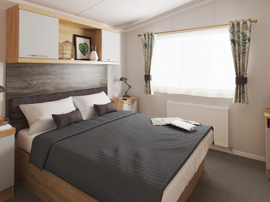 Picture of the master bedroom in a Swift Bordeaux 35 x 12  2 bedroom Static Holiday Caravan sited at Friary Farm Caravan Park, Blakeney, North Norfolk.