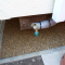 Poto of connections and blocks on the underside of a static caravan