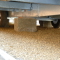 Poto of connections and blocks on the underside of a static caravan