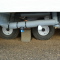 Poto of connections and blocks on the underside of a static caravan