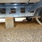 Poto of connections and blocks on the underside of a static caravan