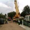 Picture of a caravan being lifted by a crane at Orchard Holiday Park, Wells-next-the-sea, Norfolk