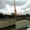 Picture of a caravan being lifted by a crane at Orchard Holiday Park, Wells-next-the-sea, Norfolk