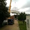 Picture of a caravan being lifted by a crane at Orchard Holiday Park, Wells-next-the-sea, Norfolk