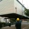 Picture of a caravan being lifted by a crane at Orchard Holiday Park, Wells-next-the-sea, Norfolk