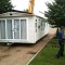Picture of a caravan being lifted by a crane at Orchard Holiday Park, Wells-next-the-sea, Norfolk