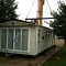 Picture of a caravan being lifted by a crane at Orchard Holiday Park, Wells-next-the-sea, Norfolk